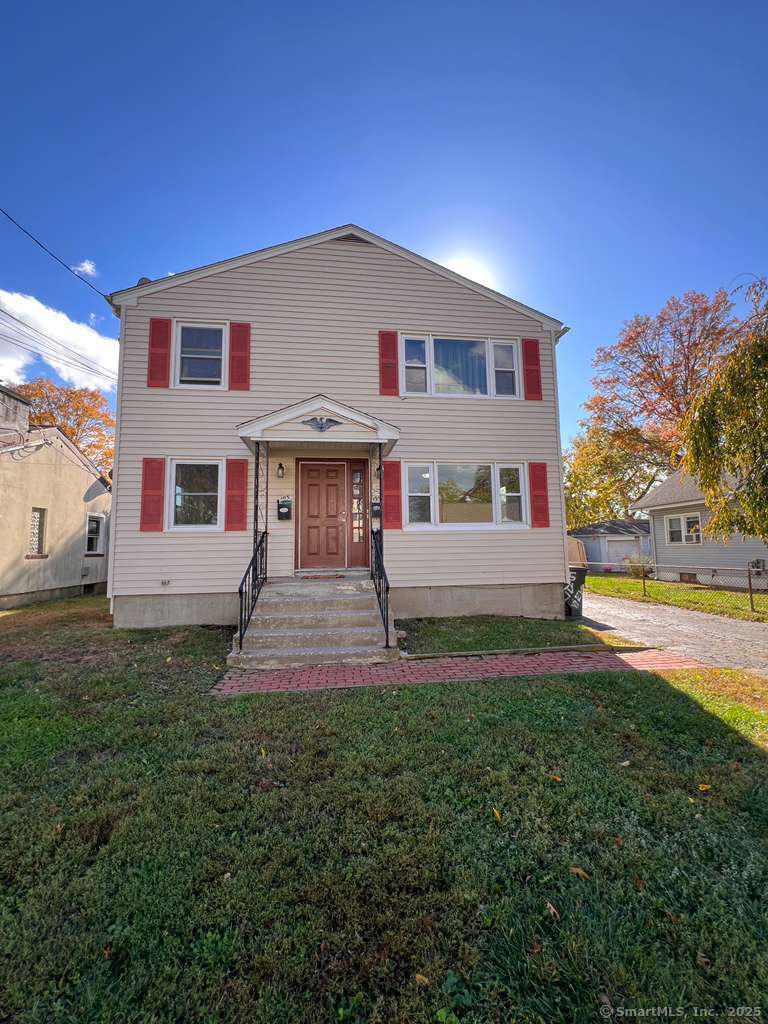 193 City View Avenue Bridgeport, CT 06606 - Photo 1 of 16 a front view of a house with a yard