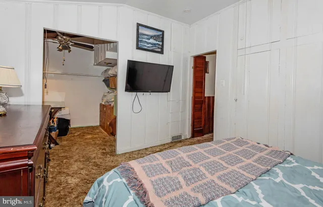 an aerial view of residential house with outdoor space and swimming pool