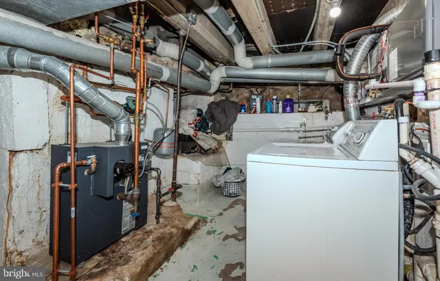 a view of a lake with a house in the background