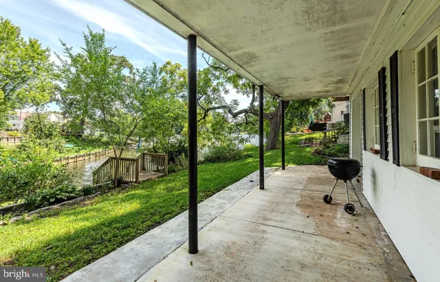 a view of a lake with a yard