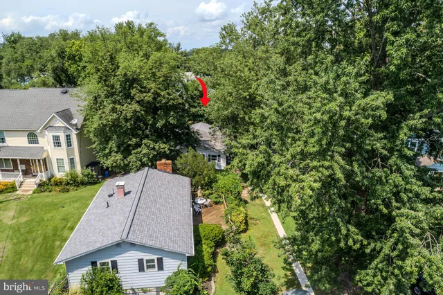 a kitchen with a refrigerator and a stove
