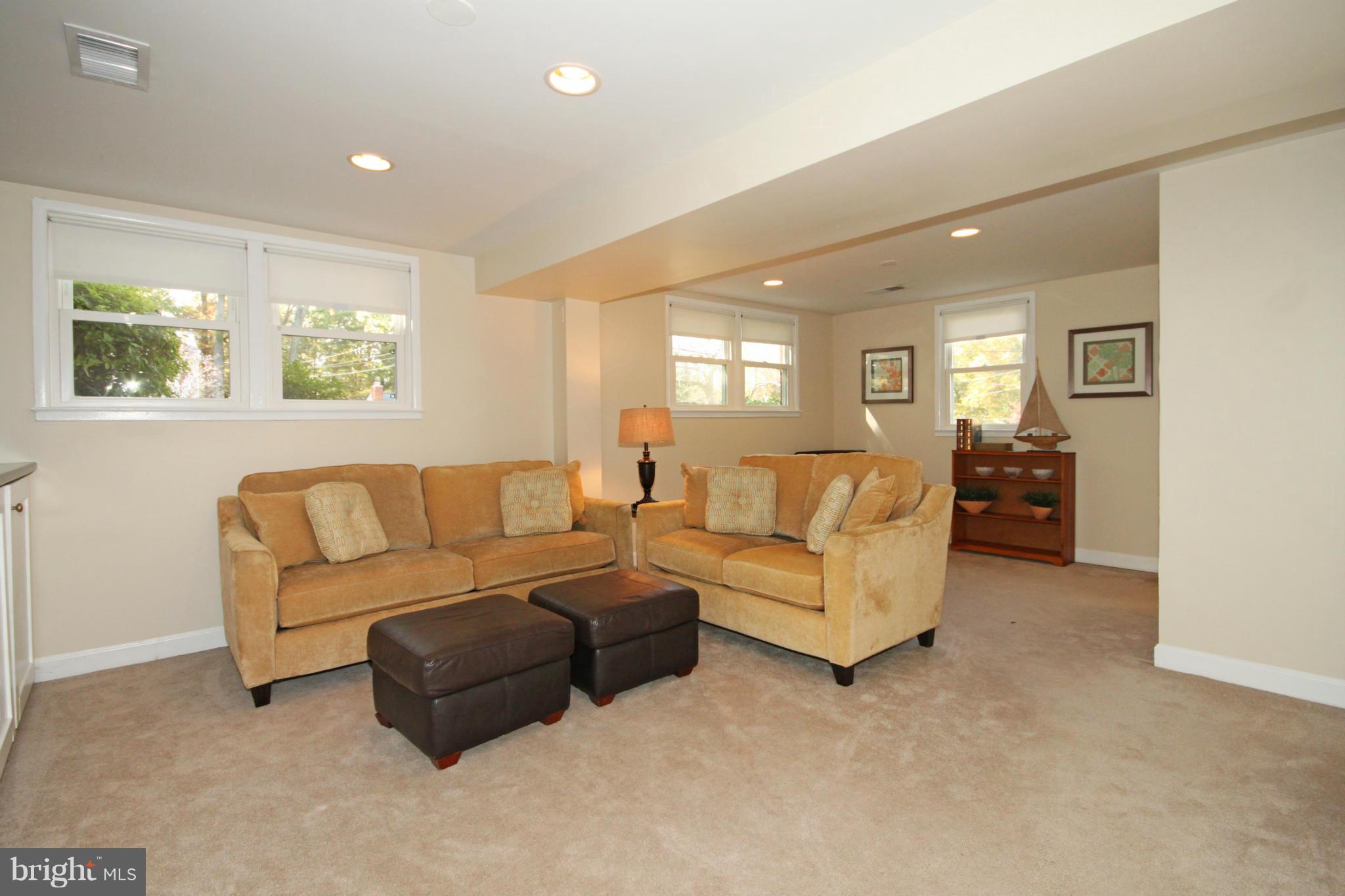 5404 Moultrie Road Springfield, VA 22151 - Photo 14 of 30 a living room with furniture and a large window