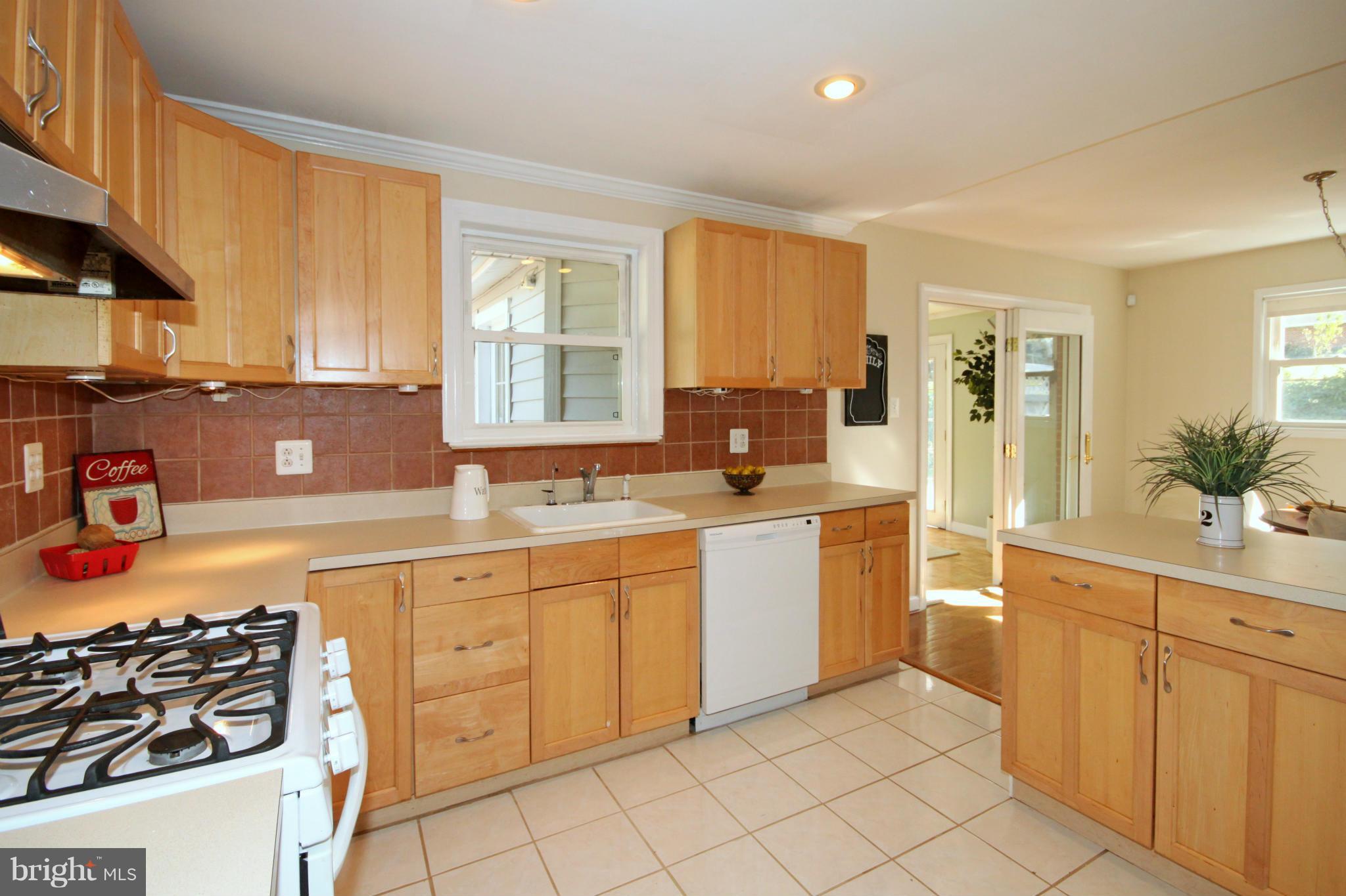 5404 Moultrie Road Springfield, VA 22151 - Photo 9 of 30 a kitchen with sink and cabinets