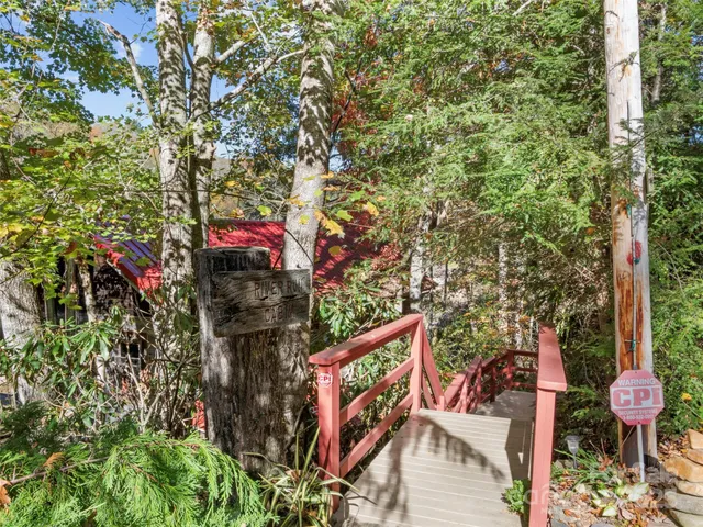 a view of outdoor space and wooden deck