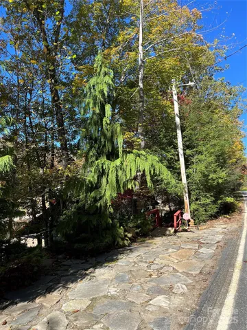 a view of a street with a building