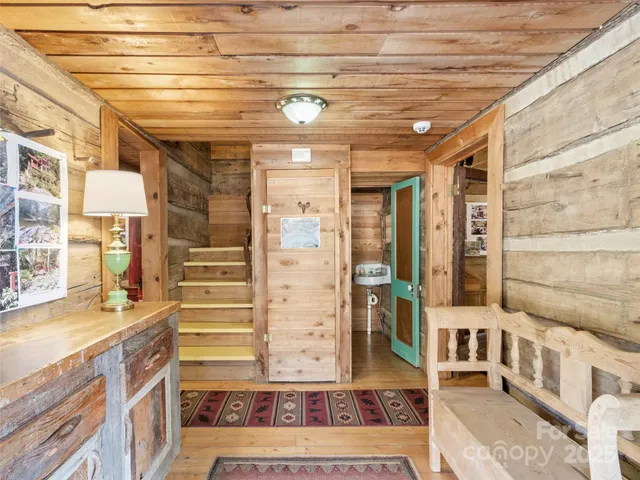 a dinning area with a table and chairs