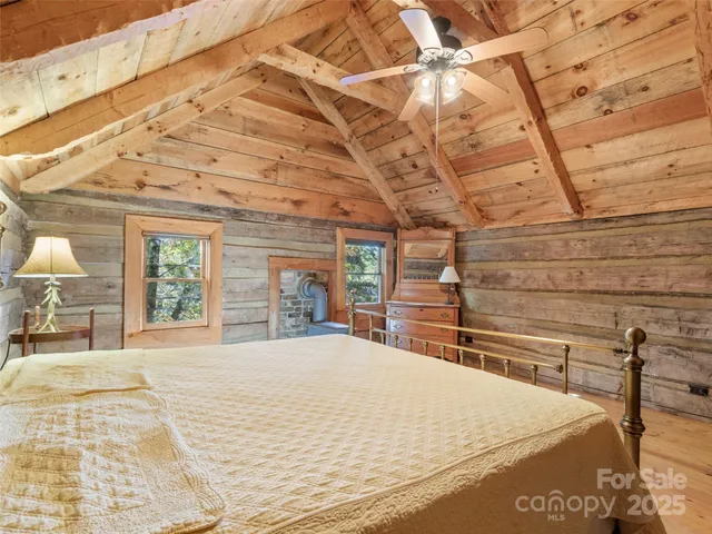 a bathroom with a sink a mirror and a shower