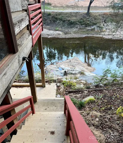 a street sign on a bunch of trees