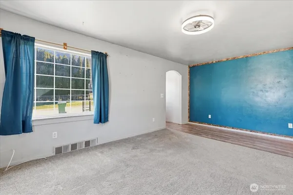 an empty room with windows