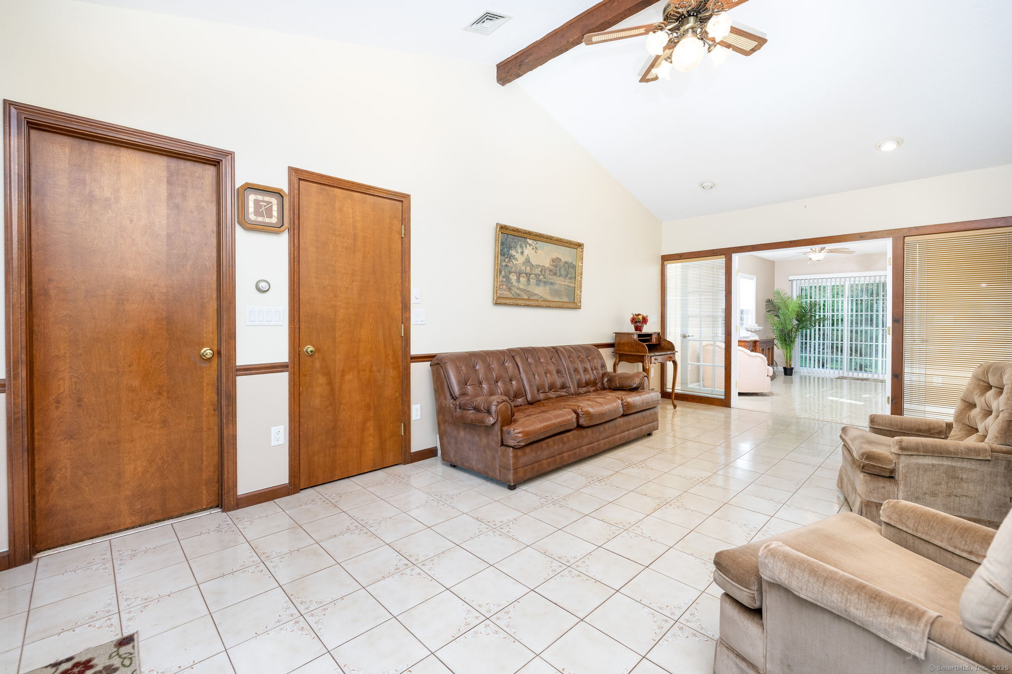 101 Collier Road Wethersfield, CT 06109 - Photo 15 of 40 a living room with furniture and a large window