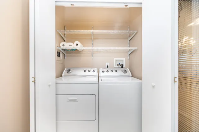 a utility room with dryer and washer