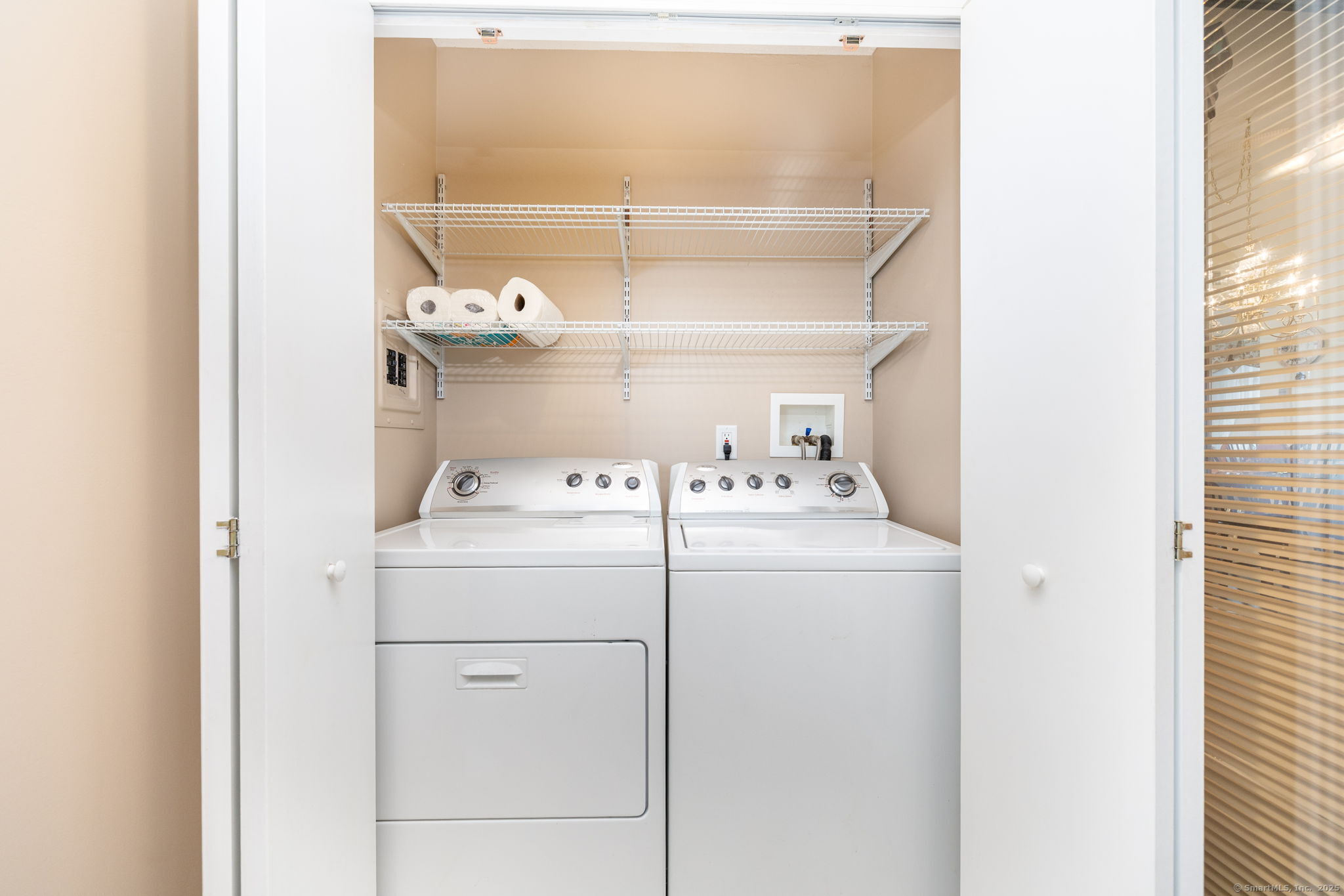 101 Collier Road Wethersfield, CT 06109 - Photo 19 of 40 a utility room with dryer and washer