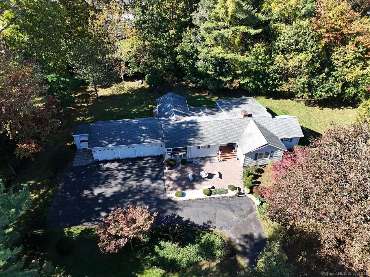 101 Collier Road Wethersfield, CT 06109 - Photo 2 of 40 an aerial view of residential houses with outdoor space