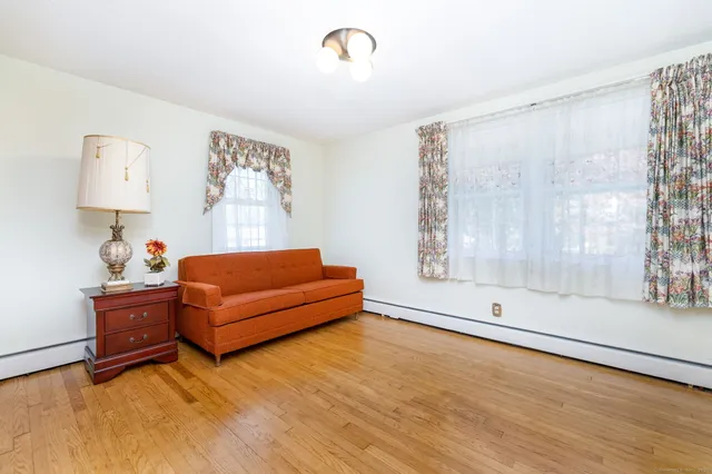 a room with furniture and a window