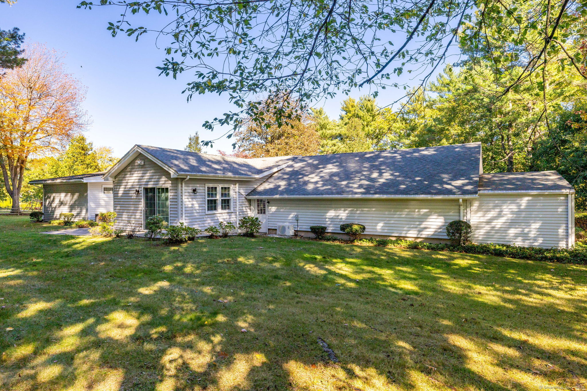 101 Collier Road Wethersfield, CT 06109 - Photo 6 of 40 a front view of a house with garden