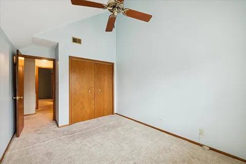 a view of a room with a walk in closet