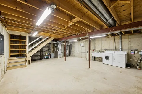 a view of an empty room with white walls