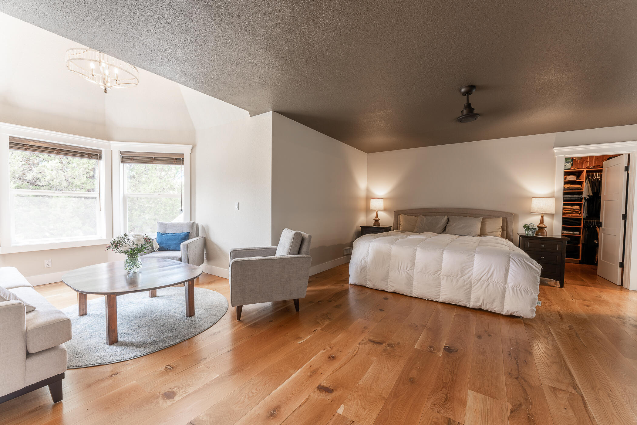 64300 Crosswinds Road Bend, OR 97703 - Photo 25 of 61 VERY SPACIOUS primary suite with a wonderful area to read or decompress at the end of your day.
