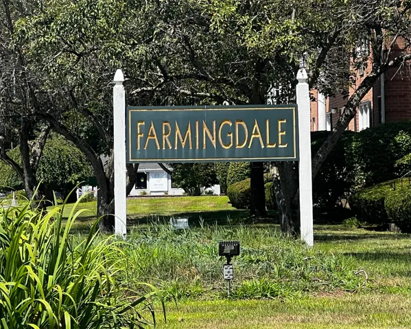 a view of outdoor space with garden and trees