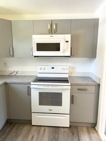 a utility room with washer and dryer