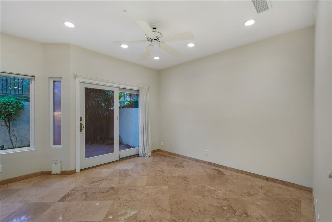 30 St Michael Dana Point, CA 92629 - Photo 16 of 33 an empty room with closet and windows