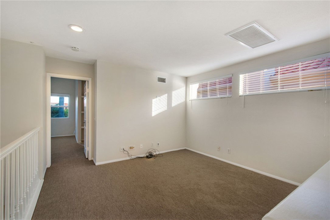 30 St Michael Dana Point, CA 92629 - Photo 29 of 33 an empty room with windows