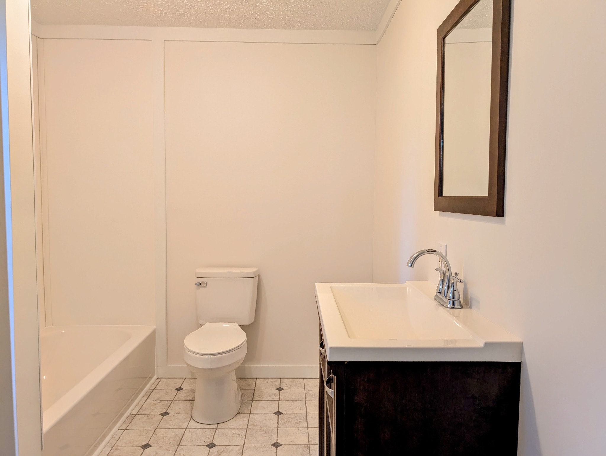 637 Robinson Road Centerville, TN 37033 - Photo 10 of 19 a bathroom with a toilet a sink and mirror