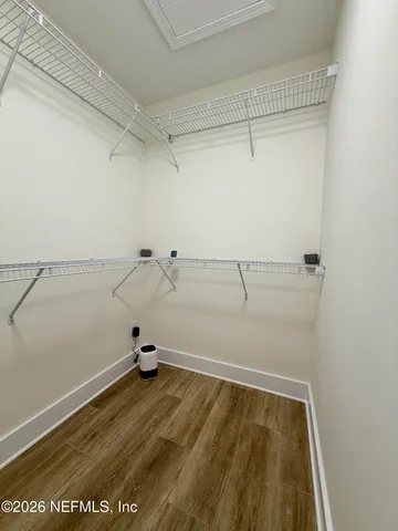 a view of a room with racks on the wall