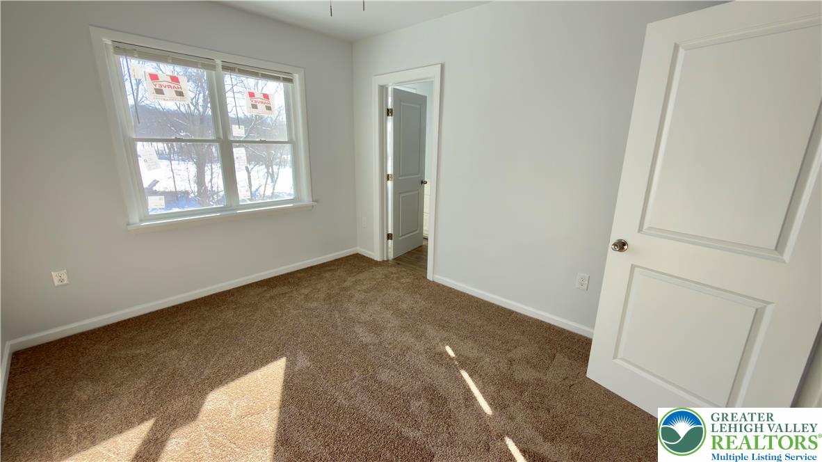 403 North Walnut Street, Unit B Bath, PA 18014 - Photo 25 of 31 an empty room with windows