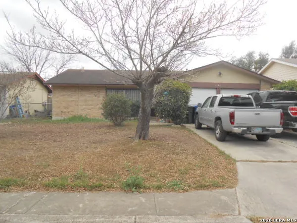 a car parked in front of a house