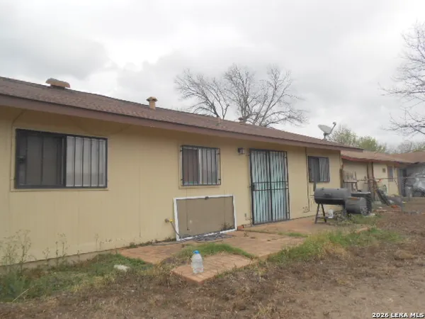a front view of a house with patio