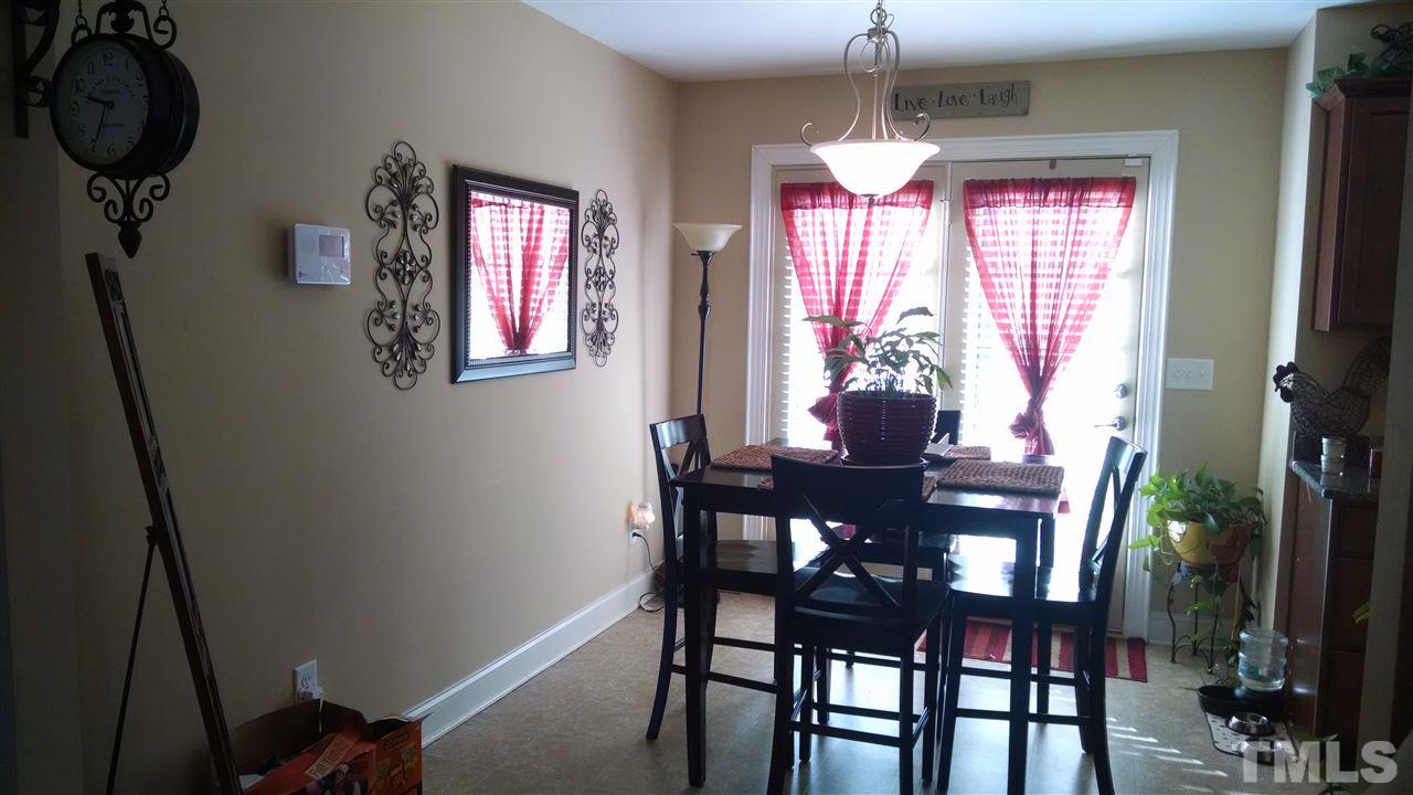 108 Orkney Road Stem, NC 27581 - Photo 14 of 22 a dining room with furniture and window