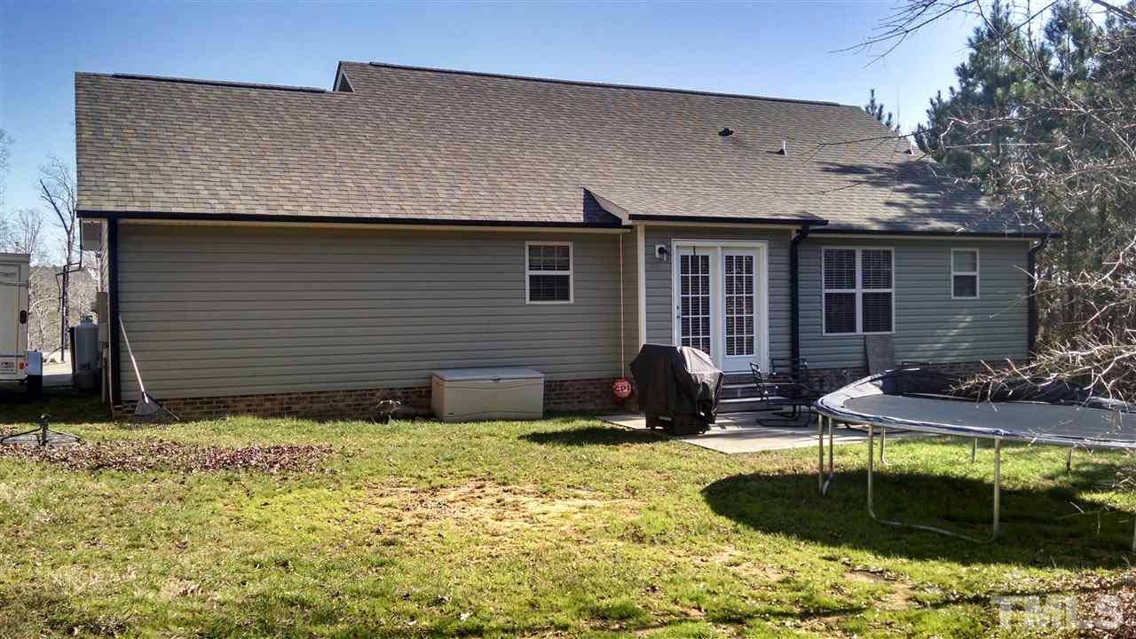 108 Orkney Road Stem, NC 27581 - Photo 20 of 22 a house view with a garden space