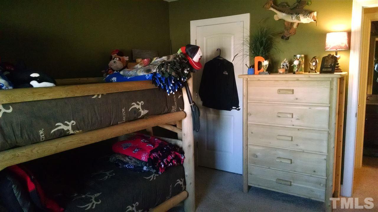 108 Orkney Road Stem, NC 27581 - Photo 9 of 22 a room with toys and dresser
