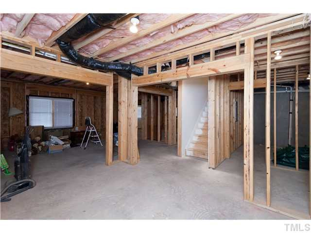 12212 Kaysmount Court Raleigh, NC 27614 - Photo 22 of 25 Tons of possibilities in this large unfinished walk out basement. Basement