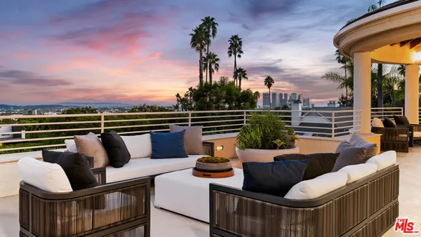 a view of a couches in a balcony