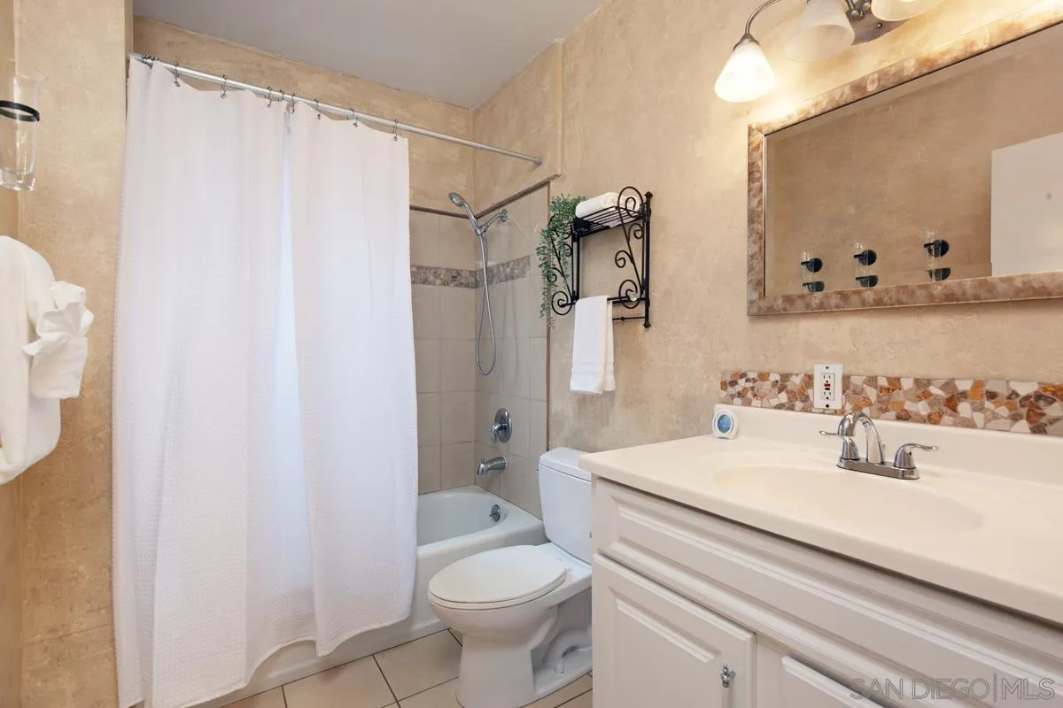 3973 8th Avenue San Diego, CA 92103 - Photo 15 of 21 a bathroom with a sink toilet and shower