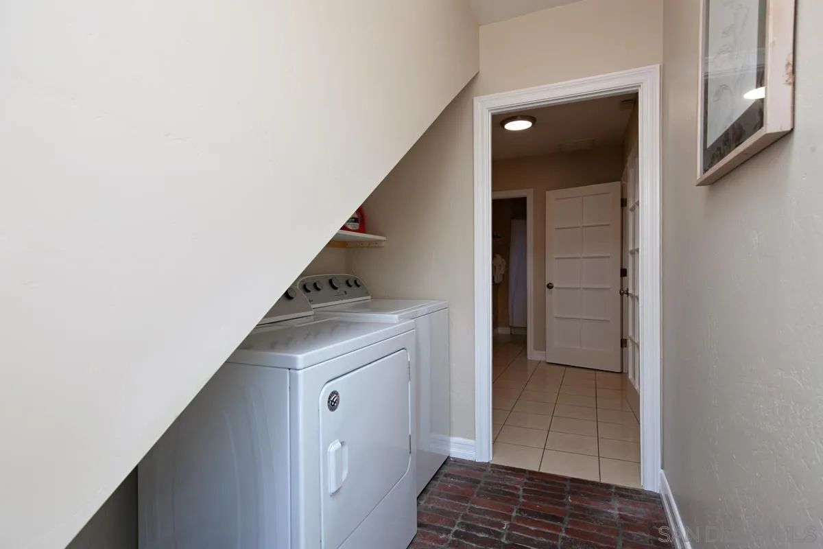 3973 8th Avenue San Diego, CA 92103 - Photo 17 of 21 a view of hallway with stairs and wooden floor