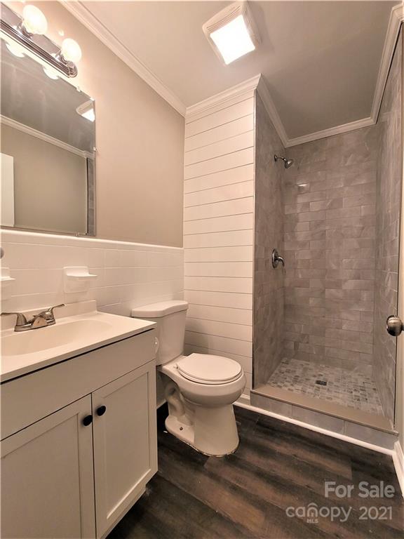 1118 Laurel Street Salisbury, NC 28144 - Photo 12 of 13 a bathroom with a sink and a mirror