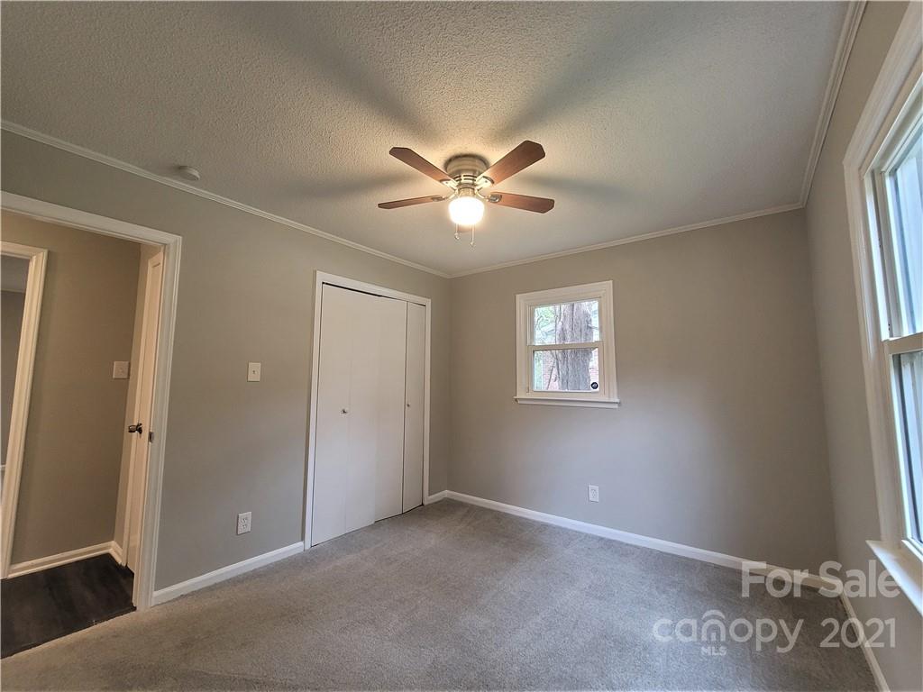 1118 Laurel Street Salisbury, NC 28144 - Photo 13 of 13 an empty room with windows and fan