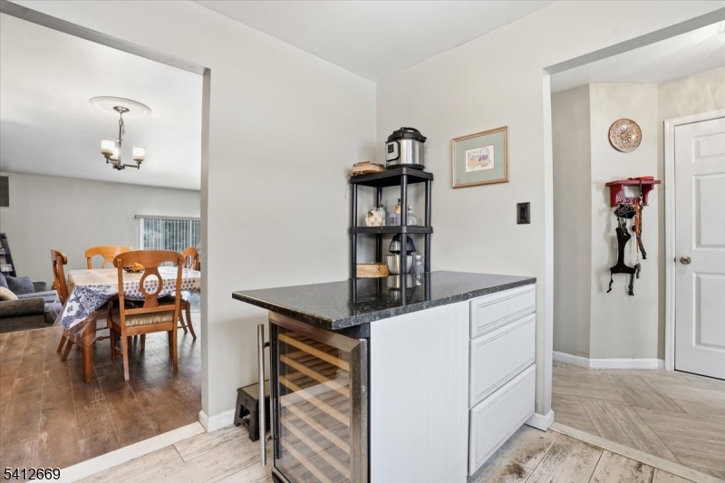 76 Hickory Way Mount Arlington, NJ 07856 - Photo 11 of 25 a kitchen with stainless steel appliances granite countertop a table and chairs