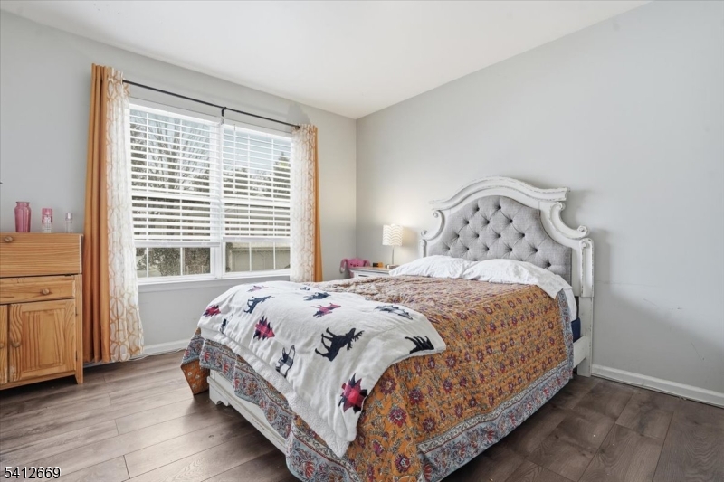 76 Hickory Way Mount Arlington, NJ 07856 - Photo 15 of 25 a bedroom with a bed and a window
