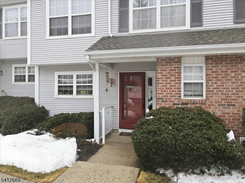 76 Hickory Way Mount Arlington, NJ 07856 - Photo 2 of 25 a view of a house with a yard