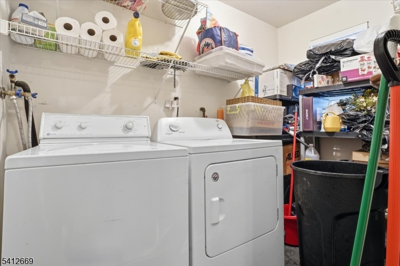 76 Hickory Way Mount Arlington, NJ 07856 - Photo 22 of 25 a utility room with dryer and washer