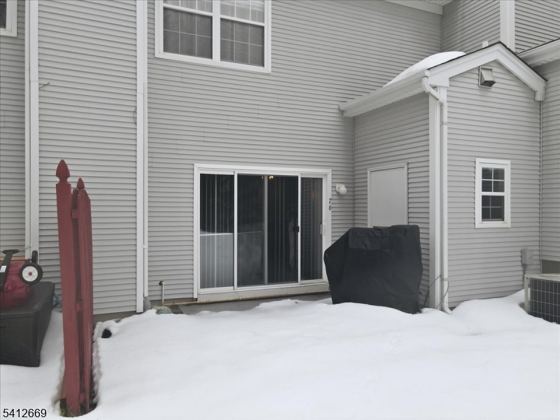 76 Hickory Way Mount Arlington, NJ 07856 - Photo 22 of 25 a house view with a backyard space