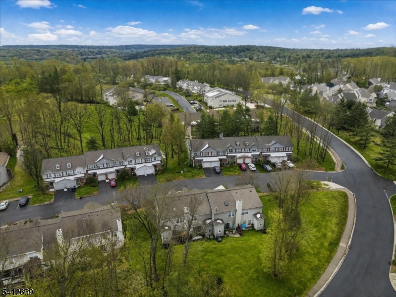 76 Hickory Way Mount Arlington, NJ 07856 - Photo 25 of 25 a view of a lake in middle of the town