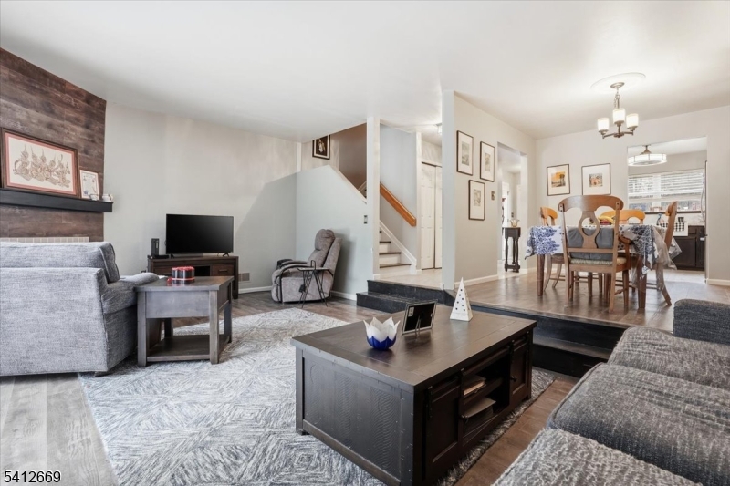 76 Hickory Way Mount Arlington, NJ 07856 - Photo 6 of 25 a living room with furniture and a flat screen tv