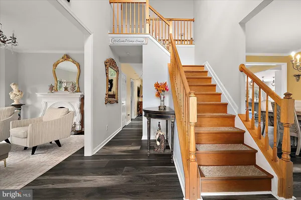 a large kitchen with a table and chairs