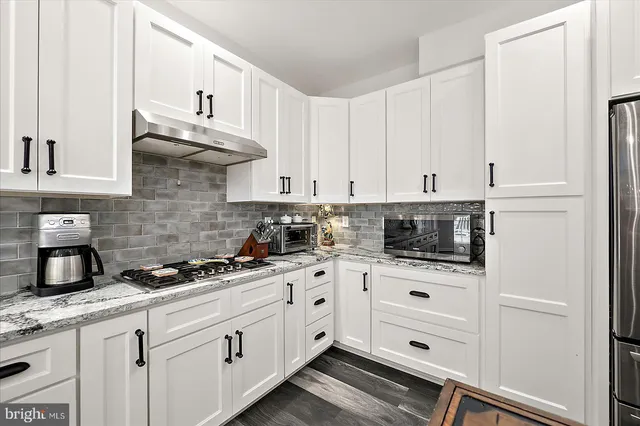 a bed room with a bed and a tv