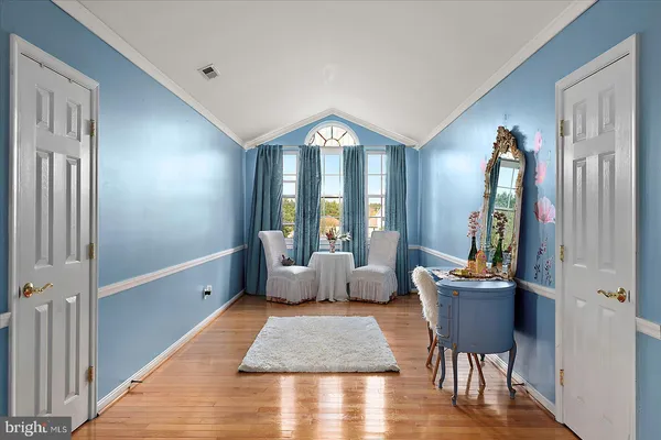 a bedroom with a bed and a closet